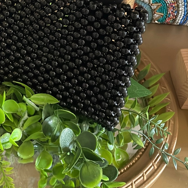 La pochette en perles plastique